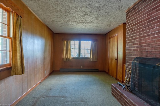 unfurnished living room featuring a fireplace, a baseboard radiator, light colored carpet, and wood walls