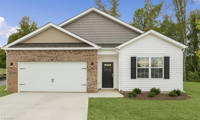 view of front of property with a garage and a front lawn