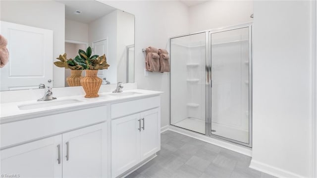 bathroom featuring vanity and walk in shower