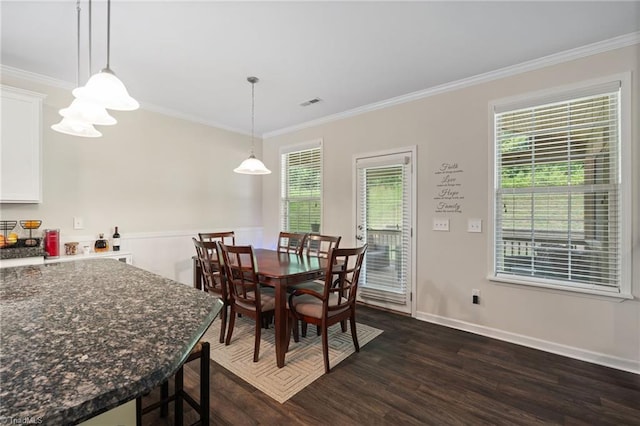 1951 Rubywood St, Greensboro, NC 27405 - dining area featuring dark wood-type flooring and crown molding