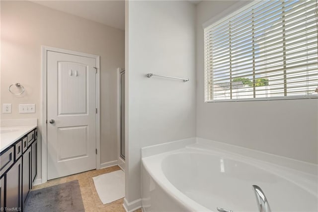 1951 Rubywood St, Greensboro, NC 27405 - full bath featuring a bath, vanity, and a shower stall