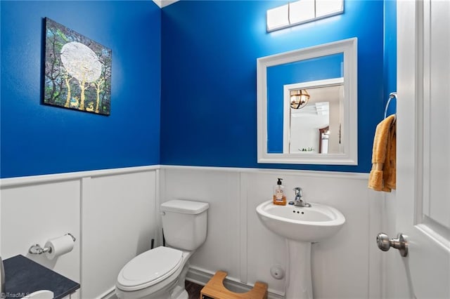 1951 Rubywood St, Greensboro, NC 27405 - half bath featuring wainscoting and a decorative wall