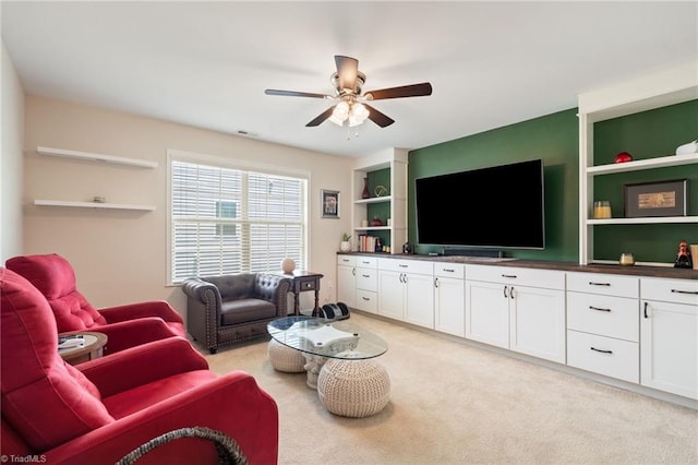 1951 Rubywood St, Greensboro, NC 27405 - living area featuring a ceiling fan and light colored carpet