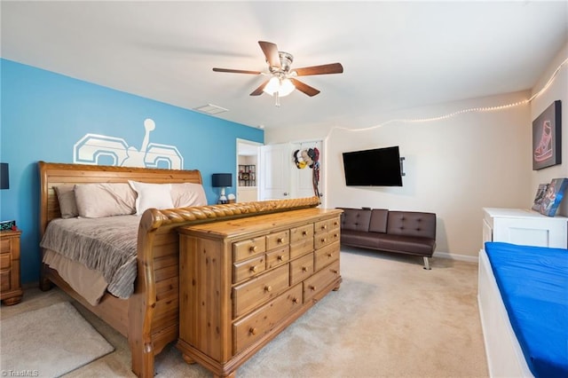 1951 Rubywood St, Greensboro, NC 27405 - bedroom featuring light carpet and a ceiling fan