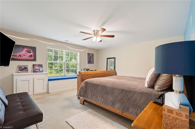 1951 Rubywood St, Greensboro, NC 27405 - carpeted bedroom featuring a ceiling fan and baseboards