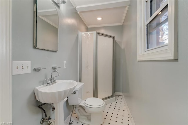 bathroom with toilet, an enclosed shower, and ornamental molding