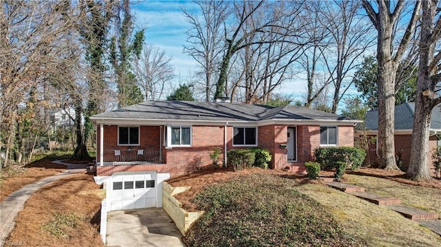 ranch-style house with a front lawn and a garage