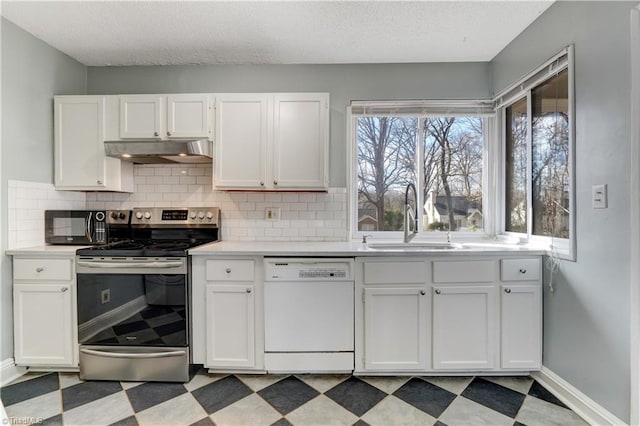 kitchen with white cabinetry, sink, white dishwasher, stainless steel electric stove, and decorative backsplash