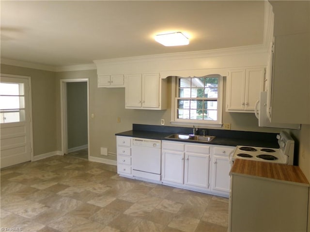 203 Turkey Hill Dr, King, NC 27021 - kitchen with white appliances, healthy amount of natural light, white cabinets, crown molding, and dark countertops