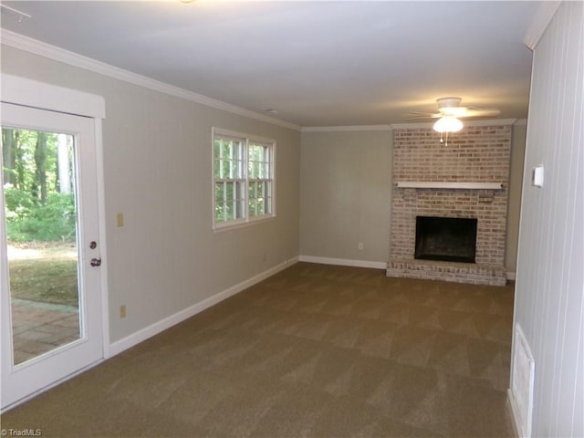 203 Turkey Hill Dr, King, NC 27021 - unfurnished living room with carpet floors, a ceiling fan, a brick fireplace, healthy amount of natural light, and crown molding