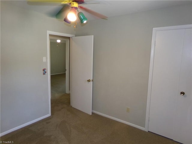 203 Turkey Hill Dr, King, NC 27021 - unfurnished bedroom featuring carpet floors and ceiling fan