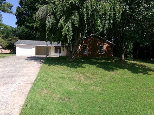 203 Turkey Hill Dr, King, NC 27021 - ranch-style house featuring driveway, a front lawn, and a carport