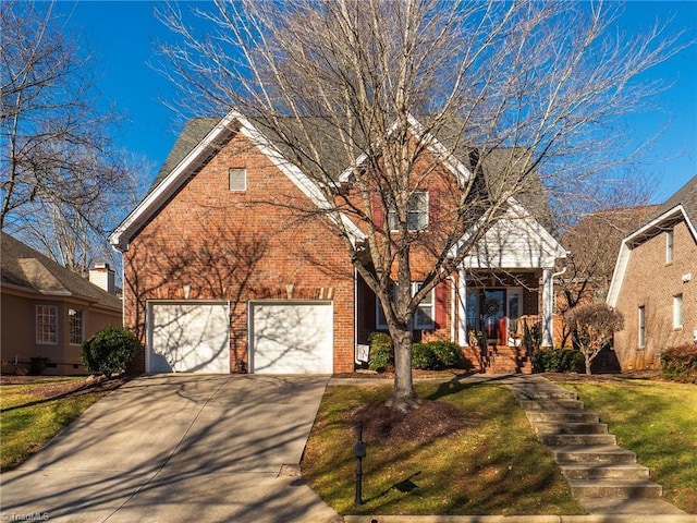 945 Northwyck Dr, Whitsett, NC 27377 - front of property featuring a garage