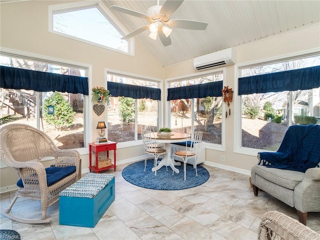 sunroom / solarium with ceiling fan, plenty of natural light, vaulted ceiling, and a wall unit AC