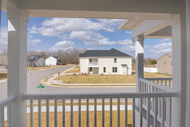 balcony featuring a residential view