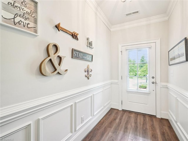 1659 Angus Ridge Dr, Kernersville, NC 27284 - entryway featuring crown molding, wainscoting, a decorative wall, and dark wood finished floors