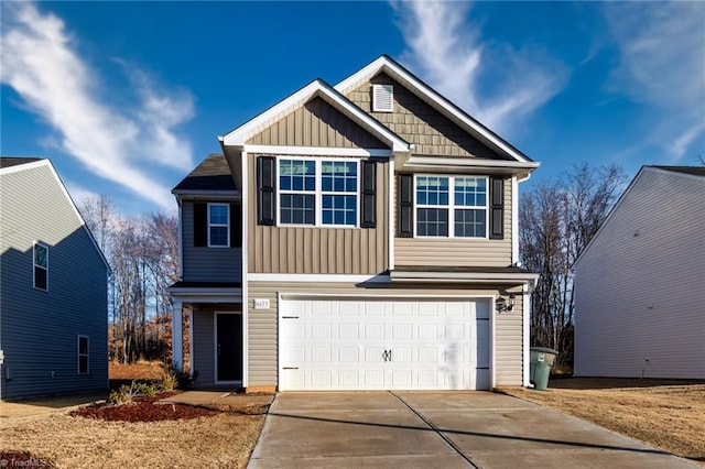 view of front of property with a garage