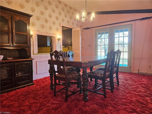112 Balcony Ln, Mount Airy, NC 27030 - carpeted dining area featuring french doors, lofted ceiling, and an inviting chandelier