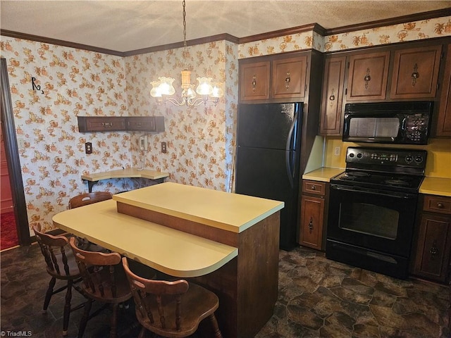 112 Balcony Ln, Mount Airy, NC 27030 - kitchen featuring a notable chandelier, black appliances, ornamental molding, decorative light fixtures, and dark brown cabinets