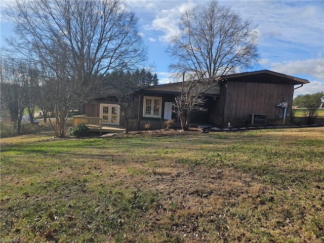 112 Balcony Ln, Mount Airy, NC 27030 - exterior space featuring a front lawn, a wooden deck, and french doors