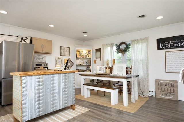 4345 Mcintyre Rd, Gibsonville, NC 27249 - kitchen with freestanding refrigerator, crown molding, dark wood-type flooring, wood counters, and recessed lighting