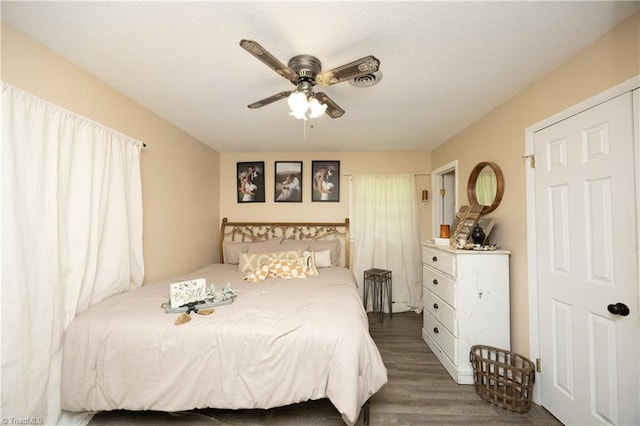 4345 Mcintyre Rd, Gibsonville, NC 27249 - bedroom featuring dark wood-style flooring and a ceiling fan