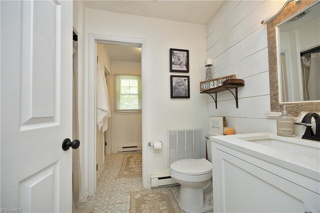 4345 Mcintyre Rd, Gibsonville, NC 27249 - full bath with a baseboard radiator and vanity