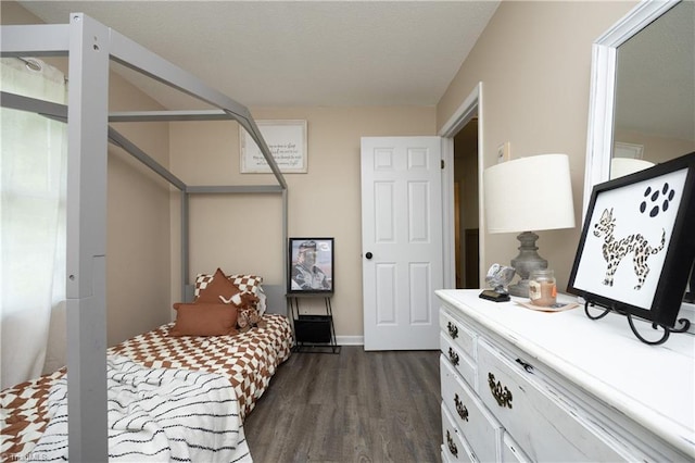 4345 Mcintyre Rd, Gibsonville, NC 27249 - bedroom featuring dark wood-style floors