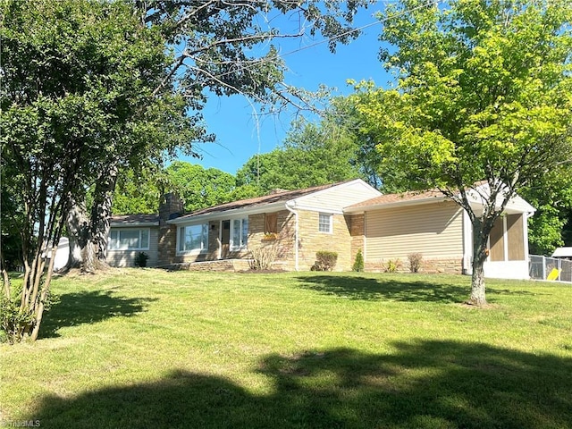 ranch-style house with a front yard