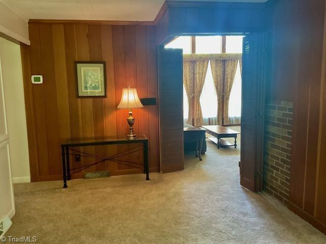 327 Lanier Dr, Lexington, NC 27295 - hall featuring carpet flooring and plenty of natural light