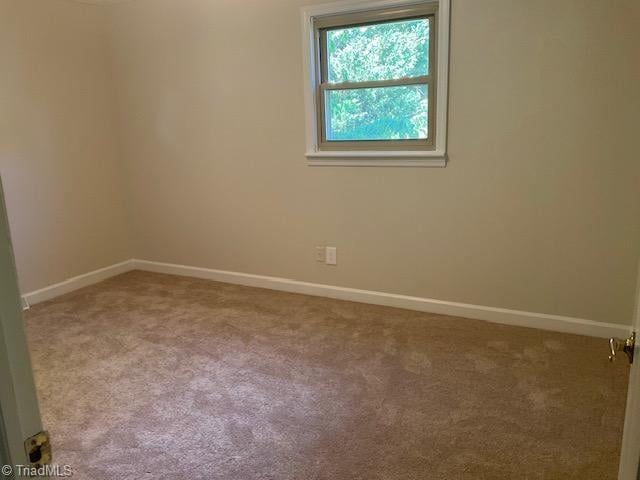 327 Lanier Dr, Lexington, NC 27295 - carpeted spare room with baseboards