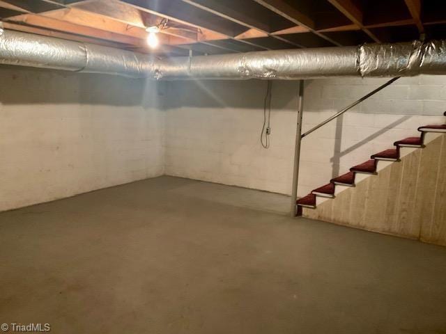 327 Lanier Dr, Lexington, NC 27295 - unfinished below grade area featuring concrete block wall and stairs