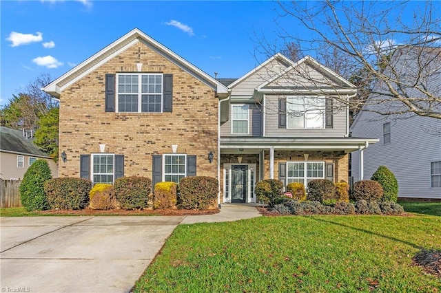 front of property featuring a front lawn