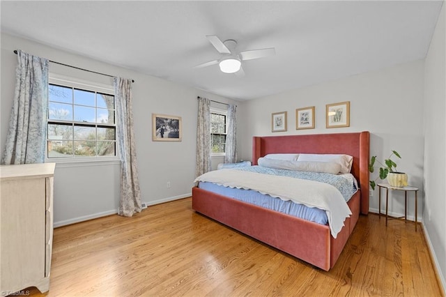 bedroom featuring ceiling fan and light wood-type flooring