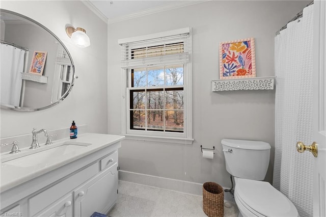 bathroom featuring vanity, crown molding, tile patterned floors, and toilet