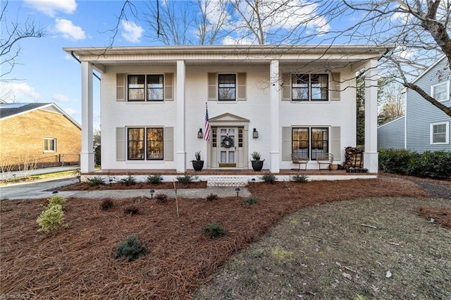 view of front facade featuring covered porch