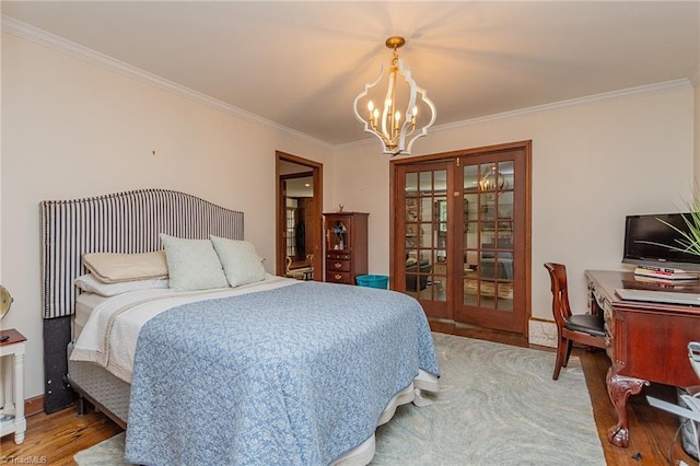 250 Oakmont Ter, Lexington, NC 27295 - bedroom with french doors, a chandelier, crown molding, and wood finished floors