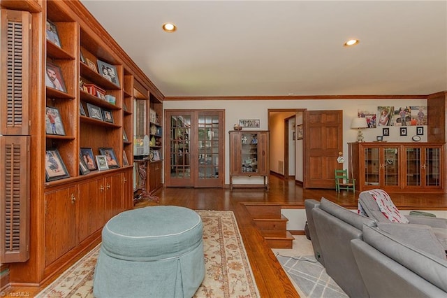 250 Oakmont Ter, Lexington, NC 27295 - living area featuring wood finished floors, crown molding, recessed lighting, and french doors