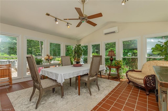 250 Oakmont Ter, Lexington, NC 27295 - sunroom featuring an AC wall unit, vaulted ceiling, tile patterned floors, and track lighting