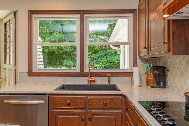 250 Oakmont Ter, Lexington, NC 27295 - kitchen featuring dishwasher, black electric stovetop, healthy amount of natural light, and tasteful backsplash
