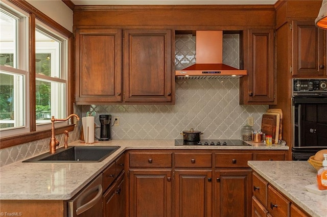250 Oakmont Ter, Lexington, NC 27295 - kitchen featuring wall chimney range hood, black appliances, tasteful backsplash, light stone countertops, and brown cabinetry