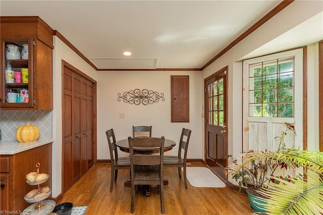 250 Oakmont Ter, Lexington, NC 27295 - dining area featuring light wood-type flooring, crown molding, attic access, and recessed lighting