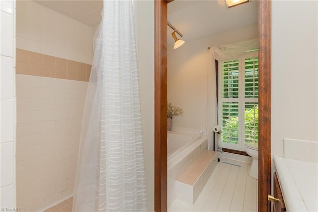 250 Oakmont Ter, Lexington, NC 27295 - full bathroom featuring tile patterned flooring, a garden tub, and plenty of natural light