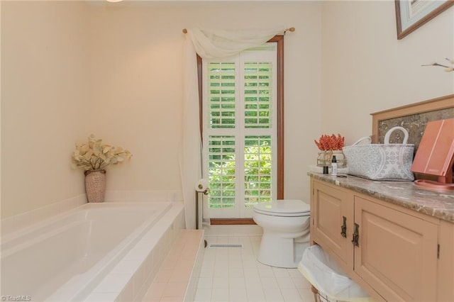 250 Oakmont Ter, Lexington, NC 27295 - bathroom featuring a garden tub, tile patterned floors, and vanity