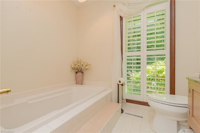 250 Oakmont Ter, Lexington, NC 27295 - bathroom featuring a garden tub, vanity, and tile patterned floors