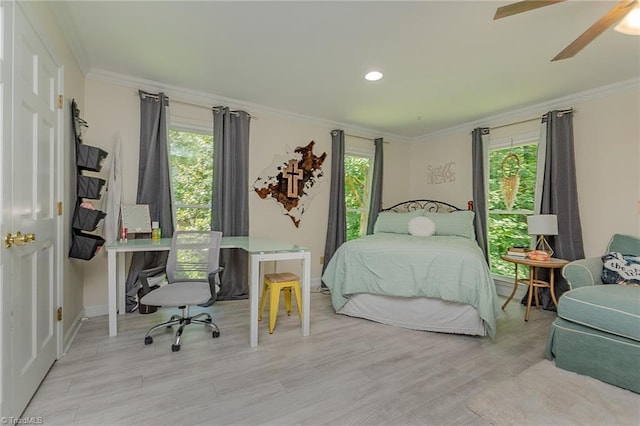 250 Oakmont Ter, Lexington, NC 27295 - bedroom with an office area, multiple windows, crown molding, wood finished floors, and recessed lighting