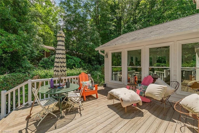 250 Oakmont Ter, Lexington, NC 27295 - wooden terrace featuring outdoor dining area and view of wooded area