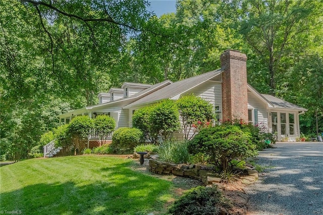 250 Oakmont Ter, Lexington, NC 27295 - view of property exterior featuring a chimney and a yard