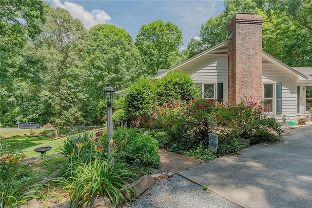 250 Oakmont Ter, Lexington, NC 27295 - view of property exterior with a chimney