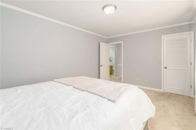 bedroom featuring ornamental molding and light colored carpet